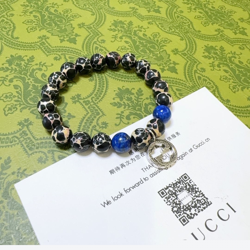 G*u*i bracelets